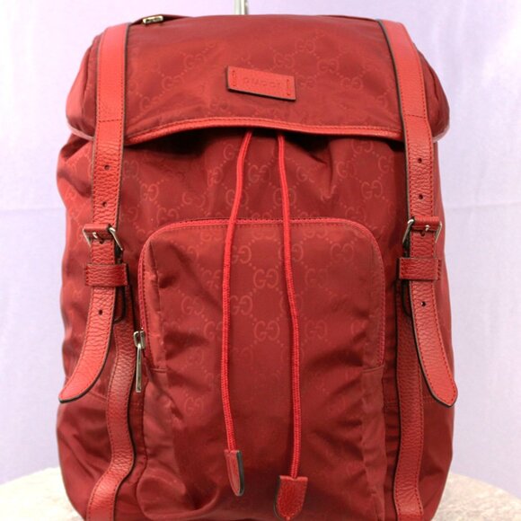 Gucci Handbags - Gucci Red GG Nylon Backpack Leather Trim Authentic Designer Bag